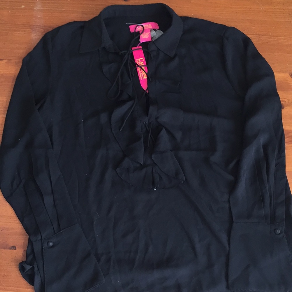 Beautiful women’s blouse. Size S. New was tags